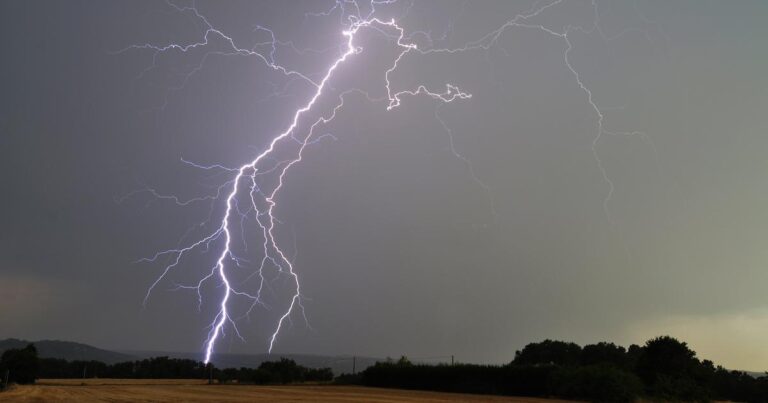 Terrifying lightning strike injures three on crowded Italian beach